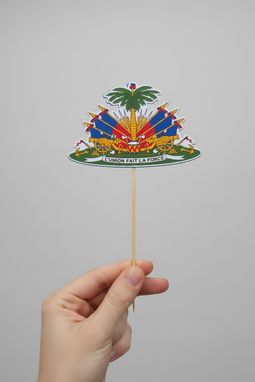 Decorative garden stake with colorful design in front of green foliage